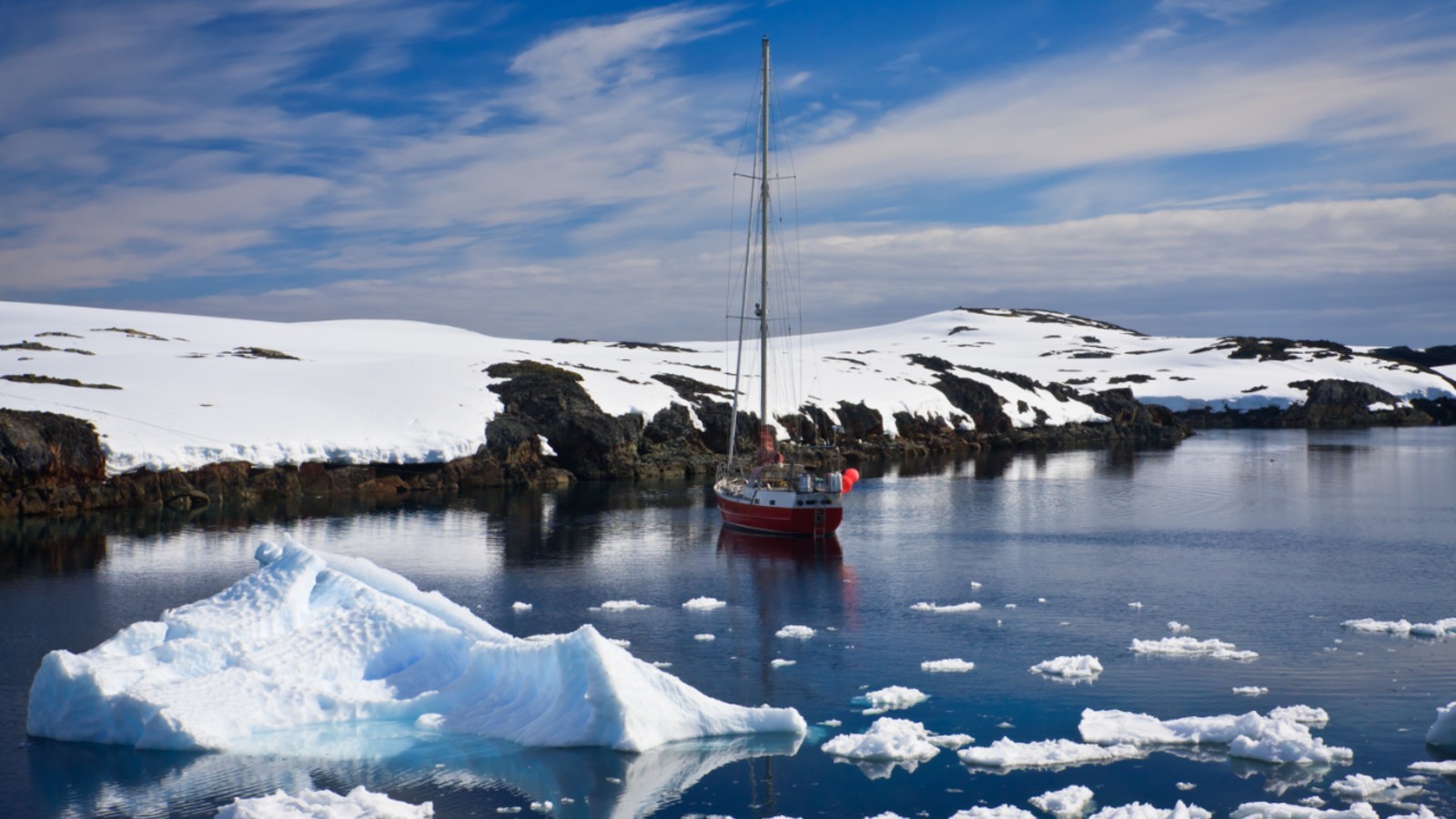 Yacht amongst the Arctic Glaciers